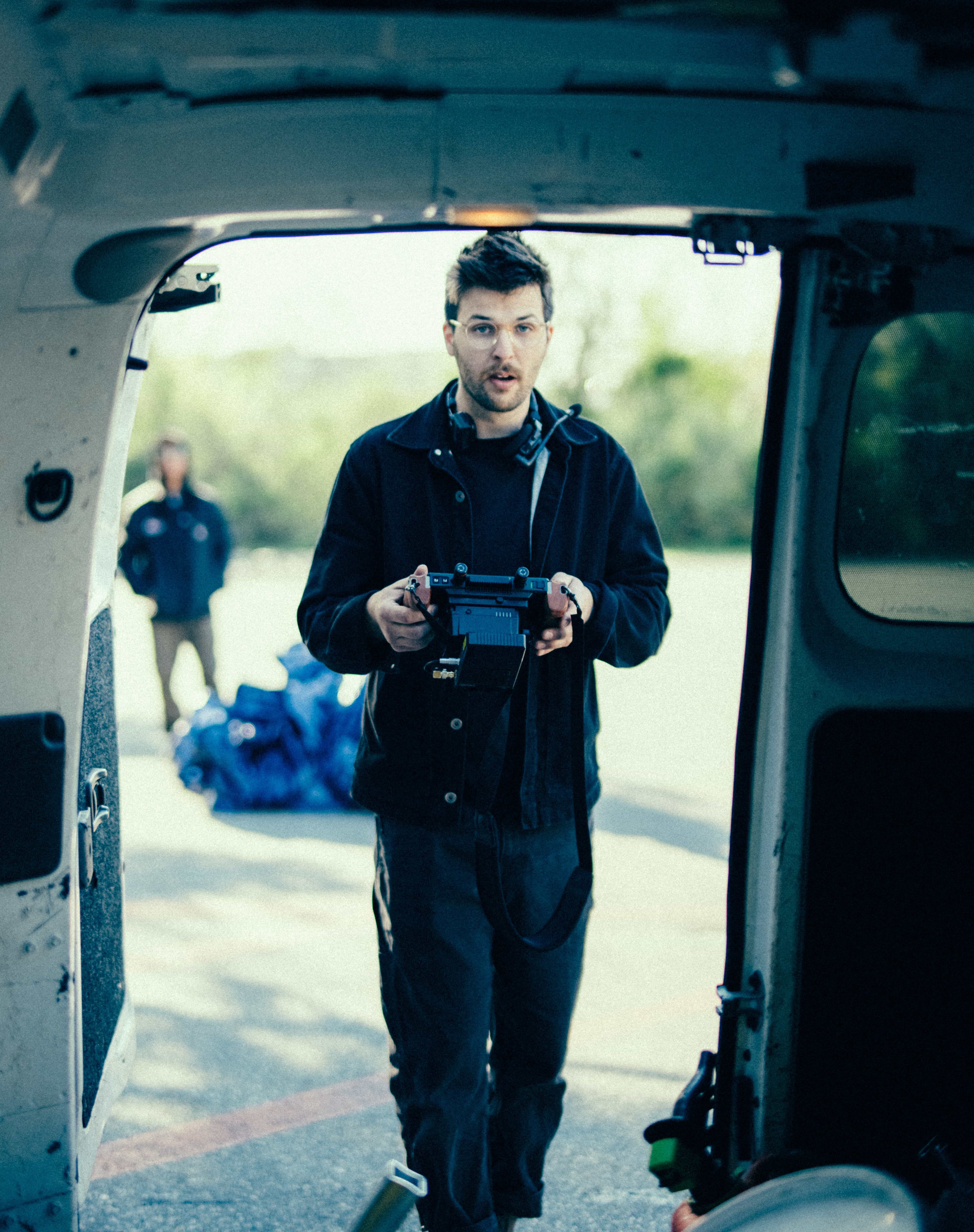 Karl Birchley, creative partner at Check It Studio, operating a gimbal controller on location